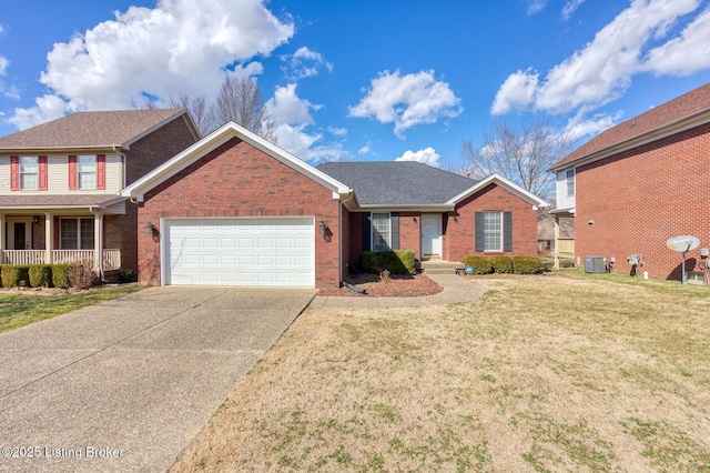 view of front of house with a garage, a front yard, brick siding, and driveway