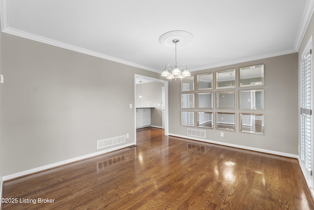 unfurnished dining area with ornamental molding, visible vents, and a chandelier