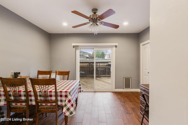 dining area with baseboards, a ceiling fan, wood finished floors, and recessed lighting