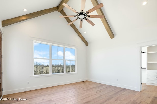 unfurnished bedroom featuring beam ceiling, high vaulted ceiling, recessed lighting, light wood-style floors, and baseboards