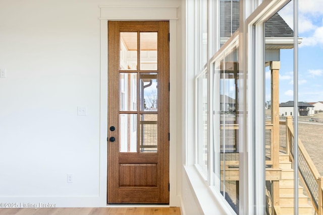 doorway to outside with a wealth of natural light