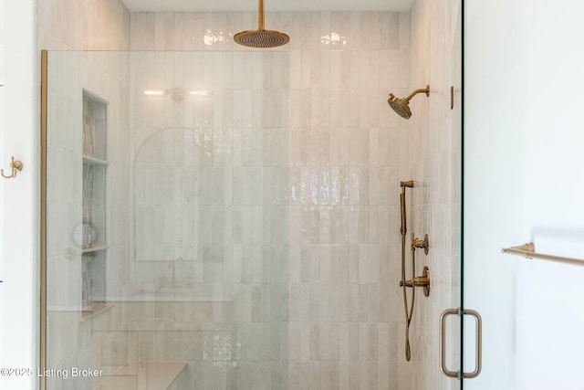 bathroom featuring a shower stall