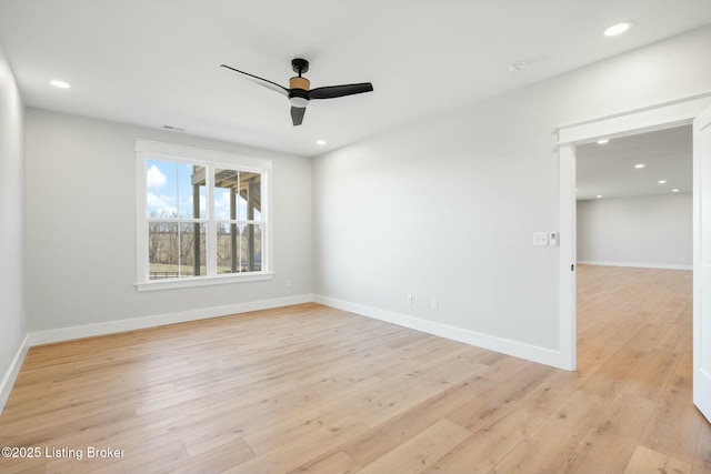 unfurnished room featuring light wood-type flooring, visible vents, a ceiling fan, recessed lighting, and baseboards