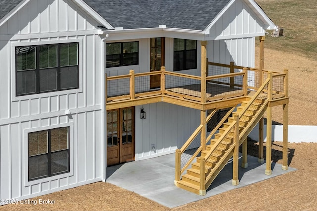 exterior space featuring stairs and a deck