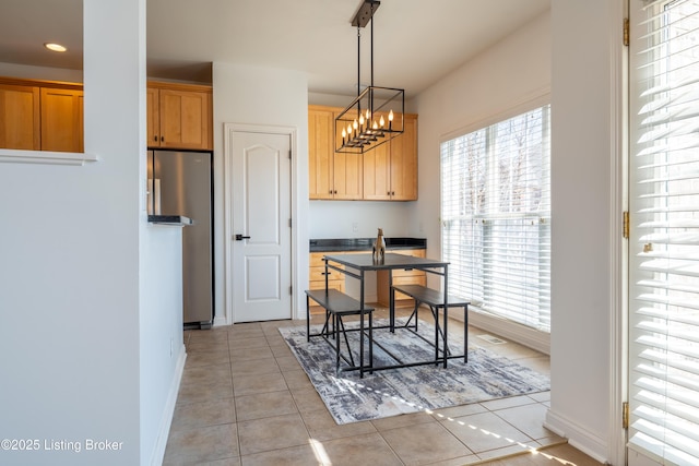 office area with baseboards, recessed lighting, light tile patterned flooring, and a notable chandelier