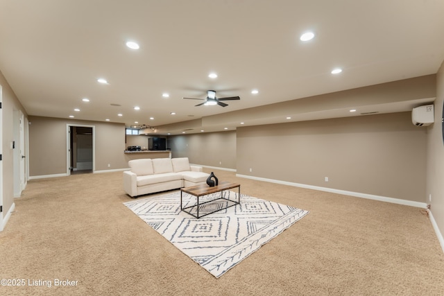 living area with light colored carpet, recessed lighting, a ceiling fan, baseboards, and a wall mounted AC