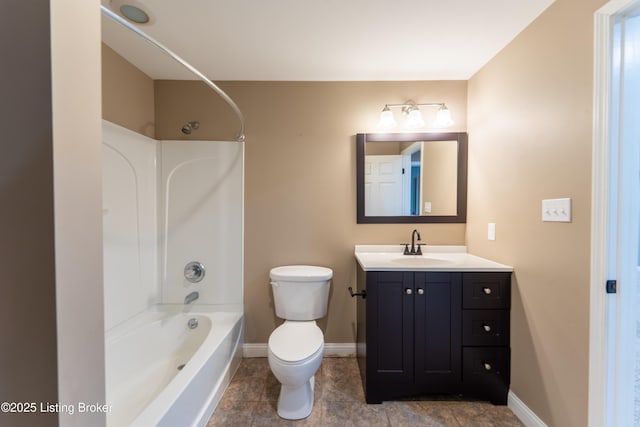 bathroom with shower / bath combination, toilet, vanity, and baseboards