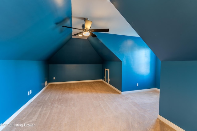 bonus room with carpet, ceiling fan, lofted ceiling, and baseboards