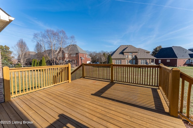 wooden deck featuring a residential view