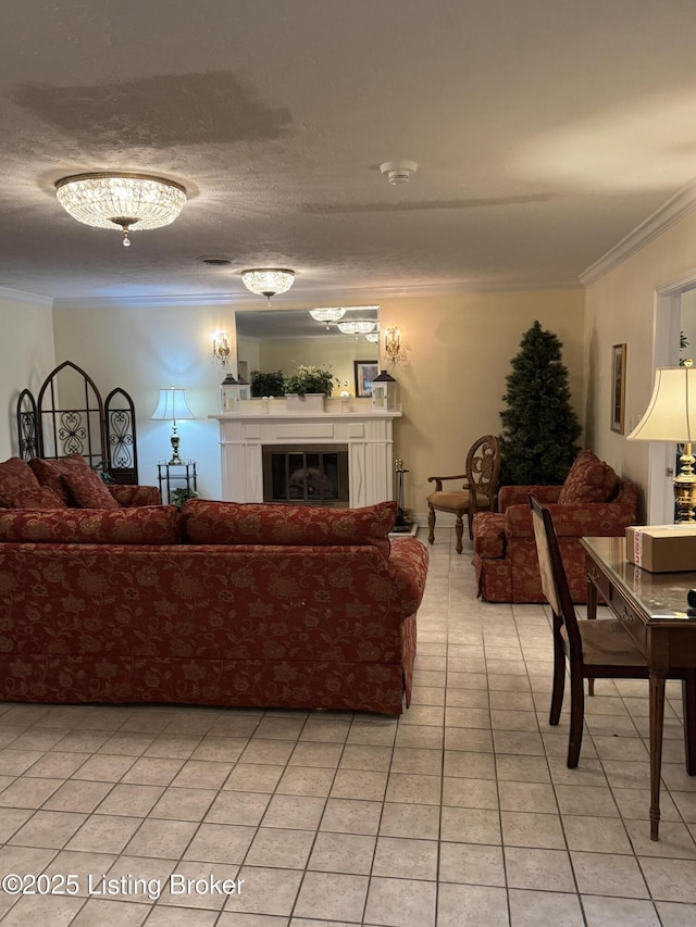 living area with light tile patterned flooring, a glass covered fireplace, and crown molding