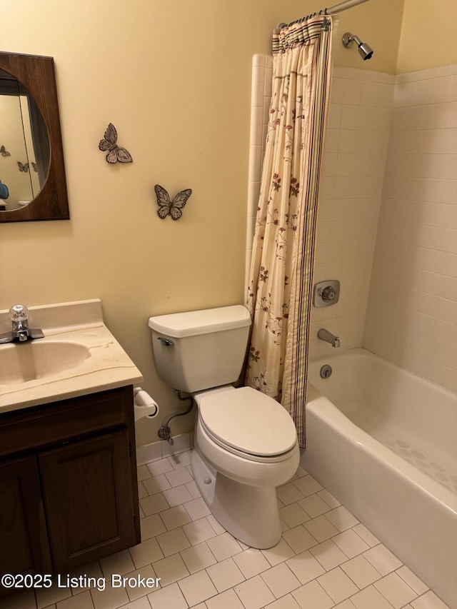 bathroom featuring shower / bath combo, tile patterned flooring, vanity, and toilet