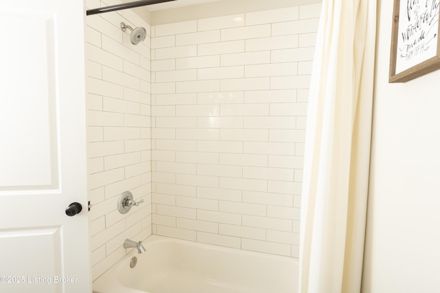 bathroom featuring shower / tub combo