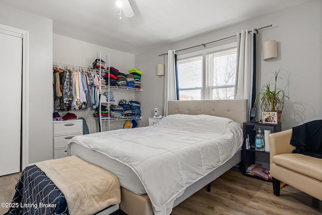 4805 Clarmar Rd, Louisville, KY 40299 - bedroom featuring a closet, wood finished floors, and a ceiling fan