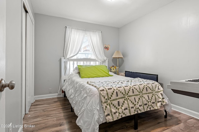 4805 Clarmar Rd, Louisville, KY 40299 - bedroom featuring wood finished floors, baseboards, and a closet