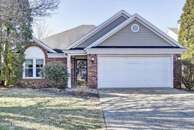 ranch-style house with brick siding, driveway, an attached garage, and roof with shingles