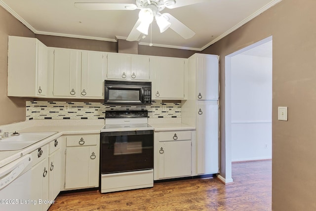 kitchen with range with electric cooktop, ornamental molding, white dishwasher, black microwave, and a sink