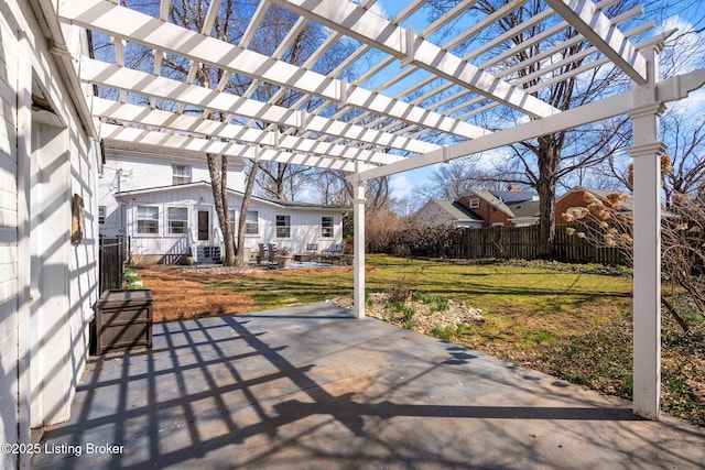 view of patio / terrace featuring entry steps, fence, and a pergola