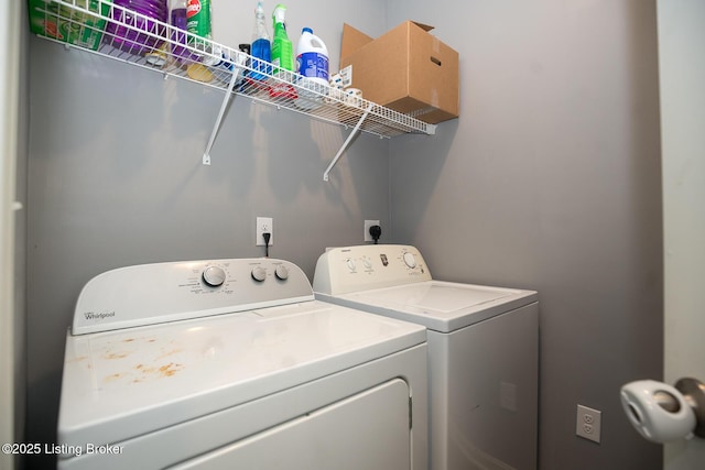 laundry area with laundry area and washer and dryer
