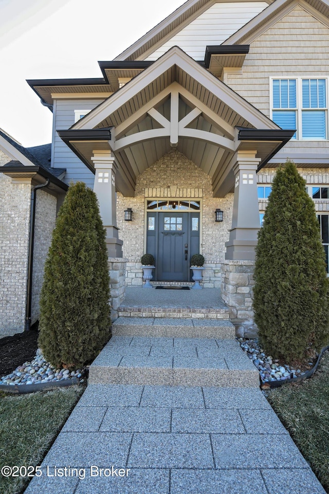 property entrance with covered porch