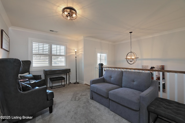 carpeted living room featuring a notable chandelier, baseboards, crown molding, and visible vents