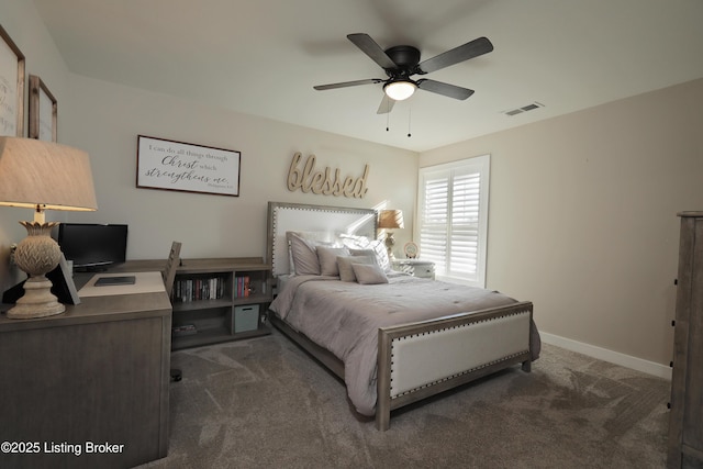 carpeted bedroom featuring visible vents, ceiling fan, and baseboards