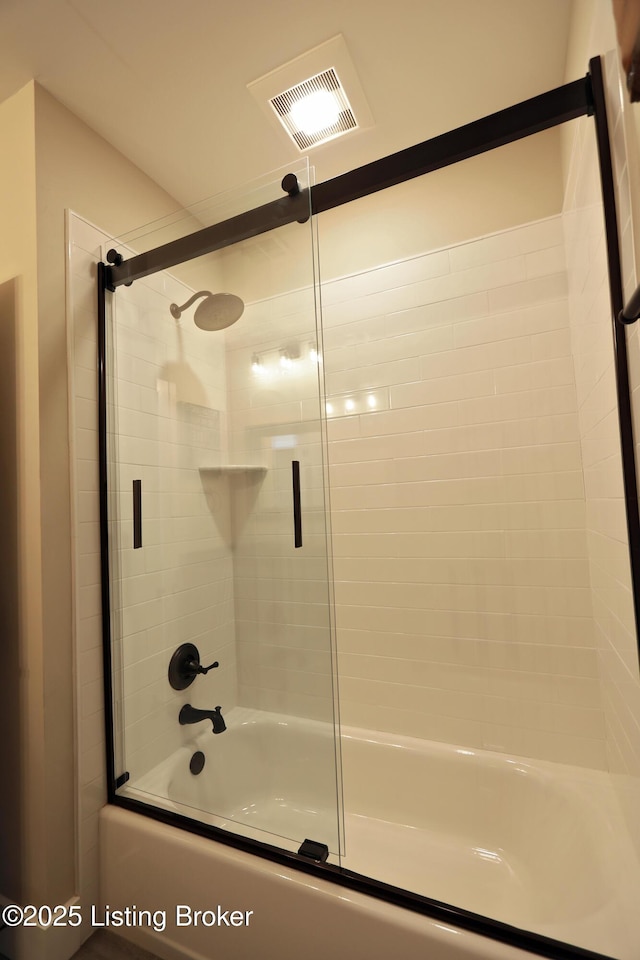 full bathroom with visible vents and shower / bath combination with glass door