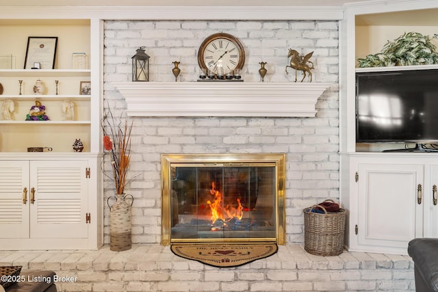 interior details featuring a fireplace