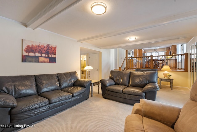 living area with baseboards, stairway, ornamental molding, beamed ceiling, and carpet