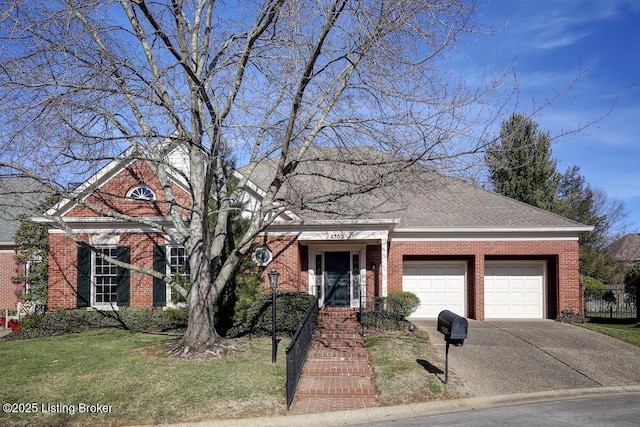 view of front of house with driveway, a front yard, a shingled roof, a garage, and brick siding