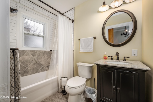 full bathroom with vanity, toilet, and shower / bath combo with shower curtain