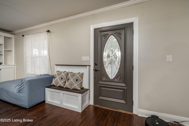 foyer with baseboards, dark wood-style flooring, and crown molding