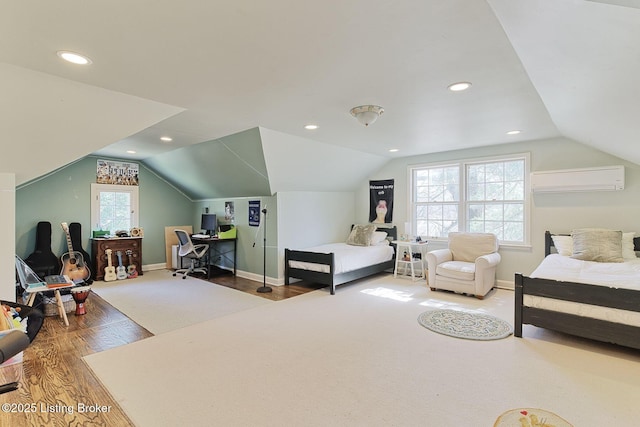 bedroom with recessed lighting, baseboards, an AC wall unit, and vaulted ceiling