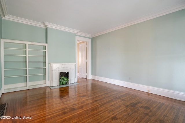 unfurnished living room with a fireplace with flush hearth, crown molding, baseboards, and wood finished floors