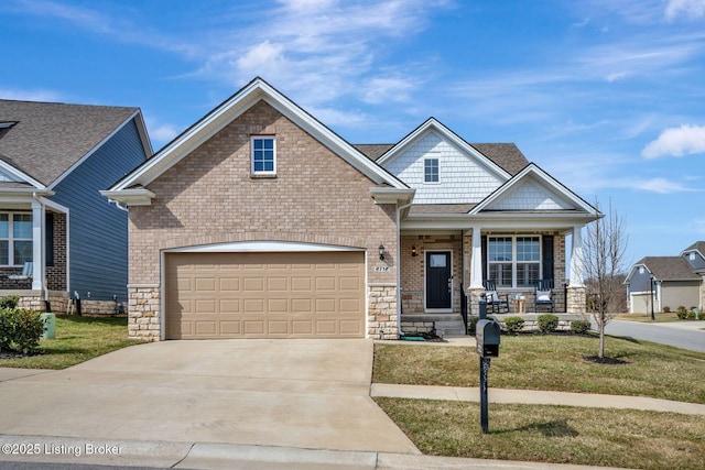 craftsman-style house with brick siding, a porch, a garage, driveway, and a front lawn