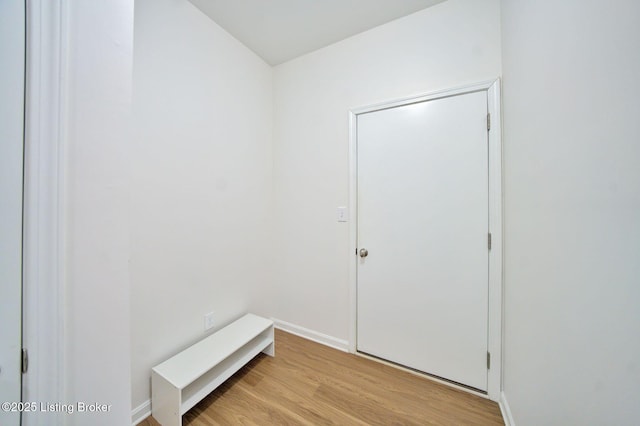 interior space featuring light wood-style floors and baseboards