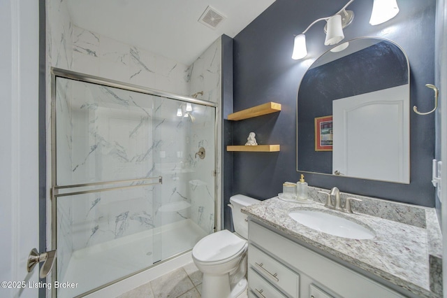 full bath with visible vents, toilet, vanity, and a marble finish shower