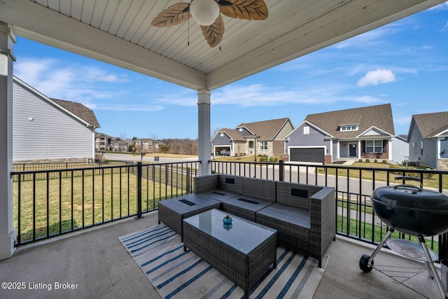 view of patio featuring a residential view, ceiling fan, an outdoor living space, and grilling area