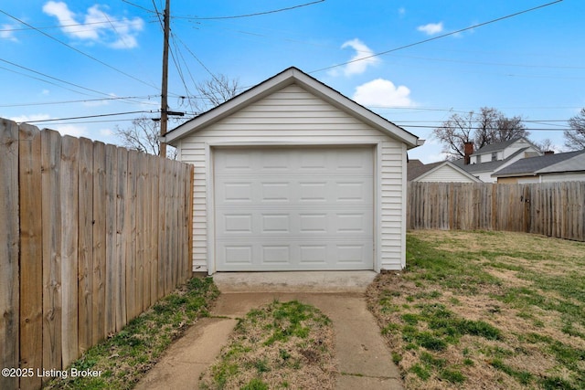 detached garage with fence