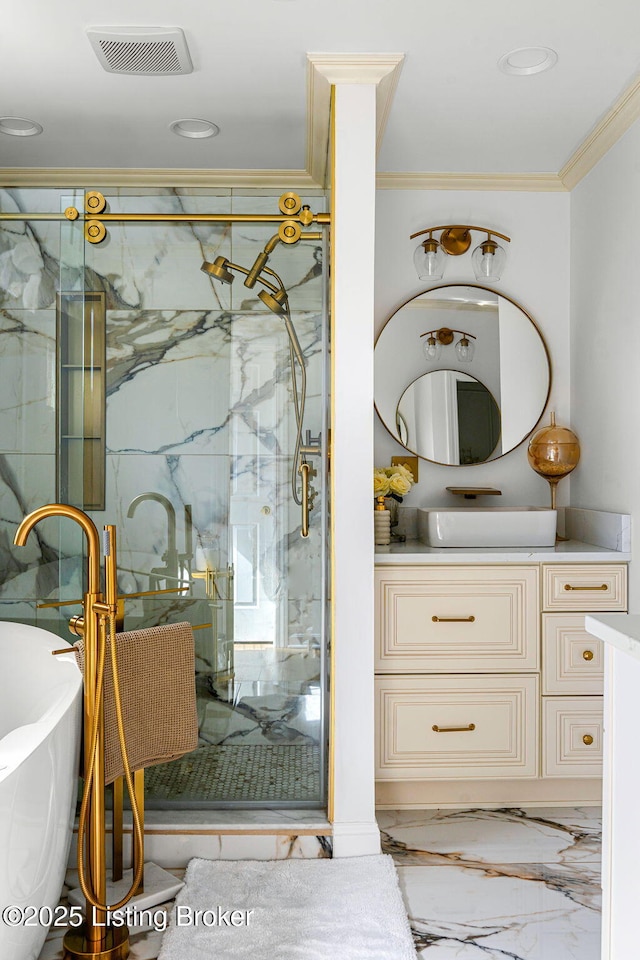 full bath featuring visible vents, vanity, a freestanding bath, a marble finish shower, and crown molding