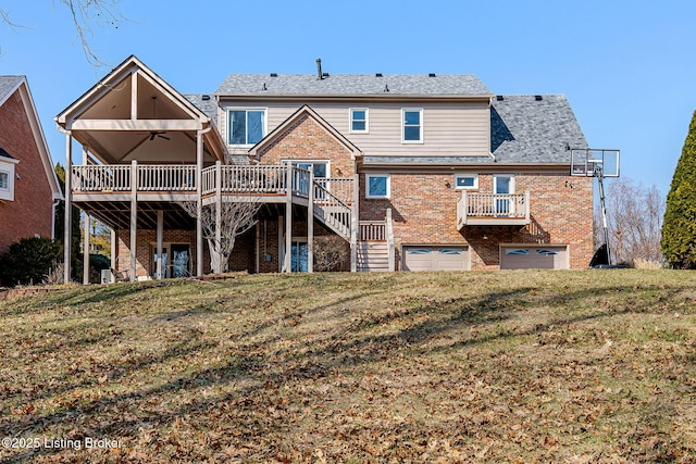 back of house with ceiling fan, a deck, a garage, brick siding, and stairway