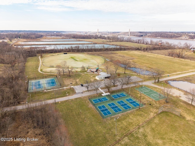 birds eye view of property featuring a water view