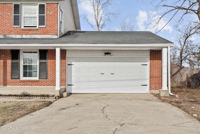 garage featuring driveway