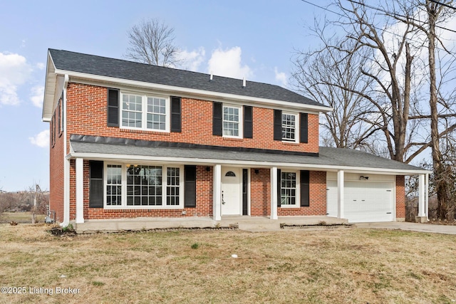 view of front facade with brick siding, a shingled roof, concrete driveway, an attached garage, and a front yard