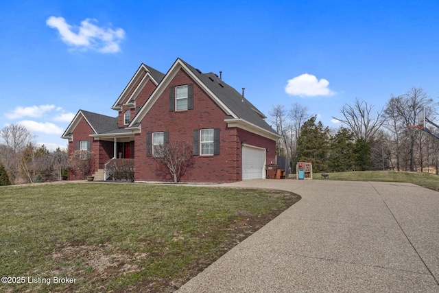 view of front of property featuring brick siding, a garage, a front lawn, and driveway