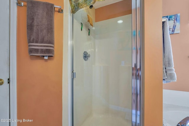 bathroom with a stall shower