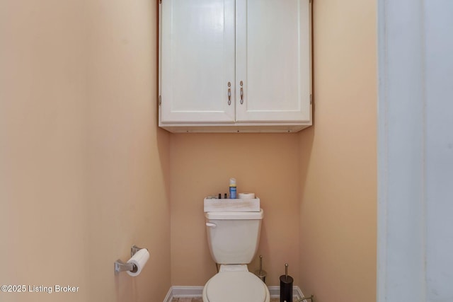 bathroom featuring toilet