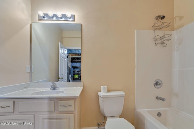 bathroom featuring shower / bathtub combination, toilet, and vanity