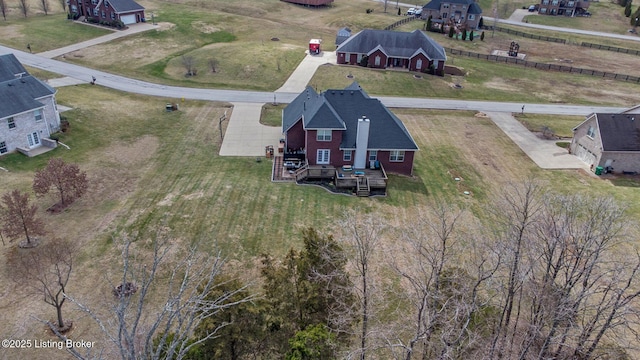 birds eye view of property featuring a rural view