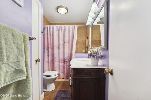 bathroom with toilet, vanity, a shower with shower curtain, and tile patterned floors