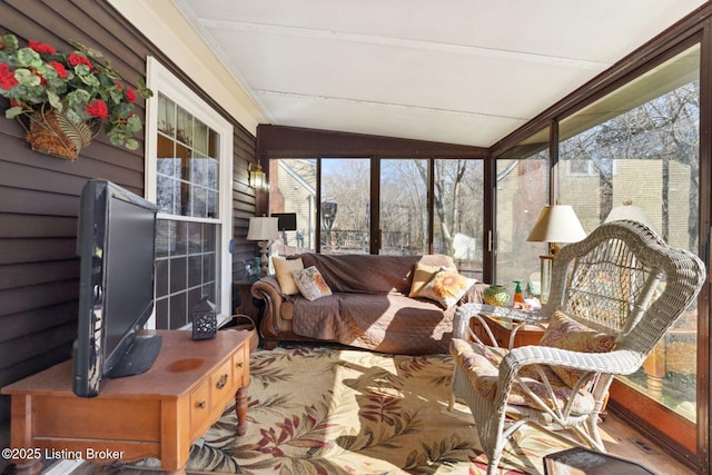 sunroom with lofted ceiling